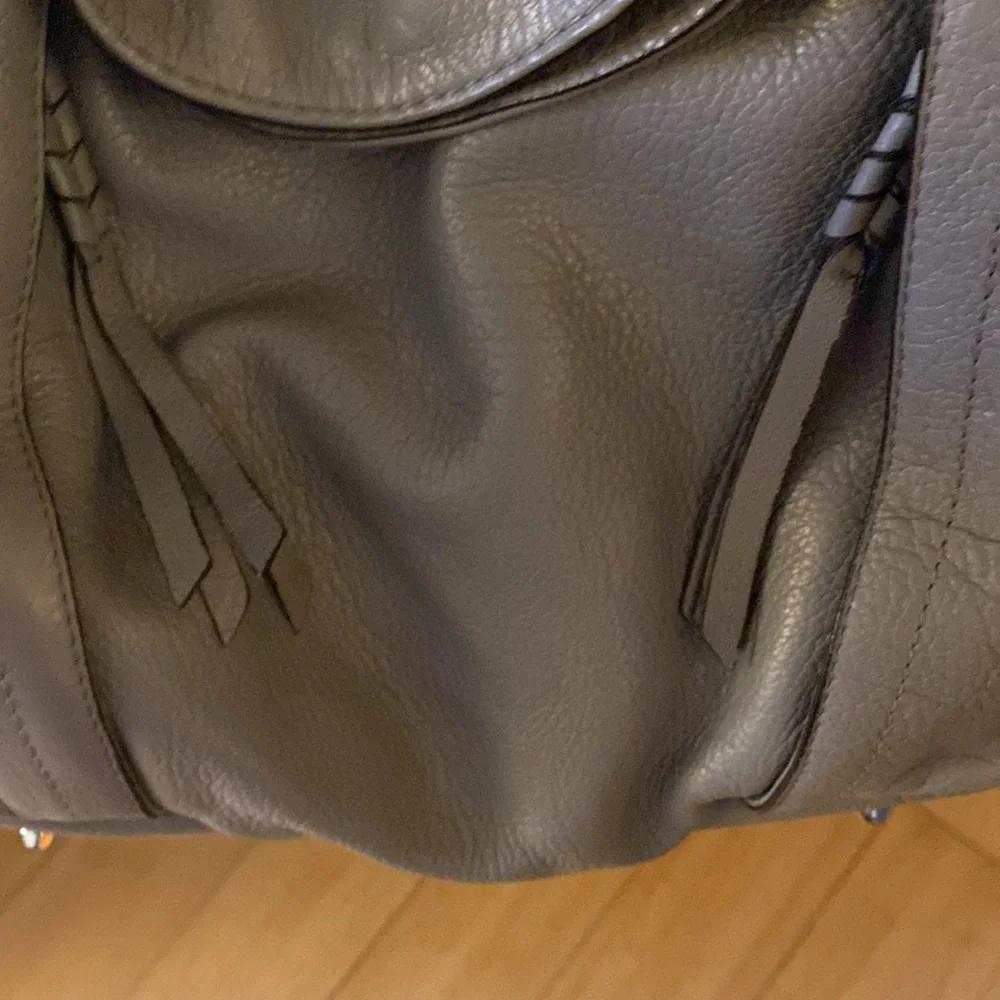 ORYANY grey bag zippers in front pocket on pocket in back Excellent condition
